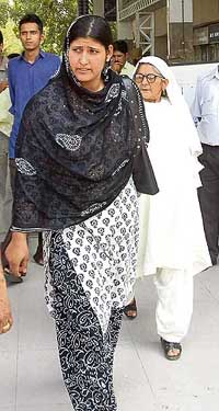 The wife and mother of Mohammad Afzal, the main accused in the Parliament attack case, at the domestic airport in New Delhi on Monday. Afzal has been sentenced to death by a Delhi court