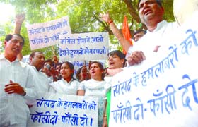 Activists of Bharatiya Janshakti Party demonstrating against the mercy petition filed on behalf of a terrorist convicted of conspiracy in the Parliament attack case