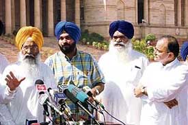BJP MP Navjot Singh Sidhu along with Mr Sukhdev Singh Dhindsa, Mr Arun Jaitley and a leader of the Shiromani Akali Dal address mediapersons at Rashtrapati Bhavan in New Delhi on Wednesday. 