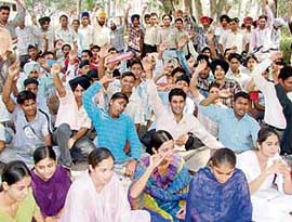 ITI students protest against fee hike at Rajpura on Thursday.