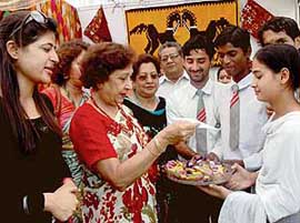 Ms Jean Rodrigues with special students of Vatika School at the inauguration of the Celebrations Fiesta ‘06 at Hotel Shivalik View, Sector 17, Chandigarh.