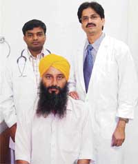 Dr Dinesh Goyal (left) and Dr K.C. Mukherjee along with patient Nirpan Singh in Ludhiana on Thursday.