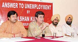 Mr Gulshan Kumar, Managing Director, GK group, addresses a press conference in Ludhiana on Friday.
