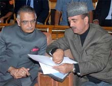 Union Home Minister Shivraj Patil with Jammu and Kashmir Chief Minister Ghulam Nabi Azad at a public meeting held at Tangdhar in Srinagar on Sunday to oversee rehabilitation work on the occasion of completion of one year after the earthquake.