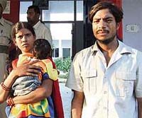Rajni Devi, who had deserted her two daughters at Bathinda bus stand, and her husband, Jagmohan Singh, in police custody in Bathinda on Sunday.