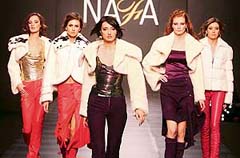 Models display fur creations by the Canadian and American association NAFA, from the ready-to-wear collection Soulis Furs S.A., at the Ukrainian fashion week in Kiev