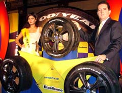 Mr Antonio Capellini, Managing Director, Goodyear, with model Amanpreet Wahi launches Excellence series, a new collection of luxury car tyres, designed with the 3-zone and ECO-sil silica tread compound technology, in New Delhi