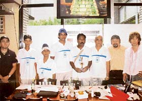 Officials of the Japan Table Soccer Federation, along with players and officials from Chandigarh, pose with an appreciation trophy