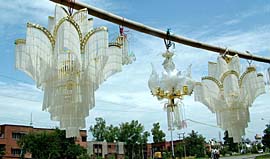 Designer chandeliers hang in the open sky as they have been put up for sale along the GT Road in Jalandhar.