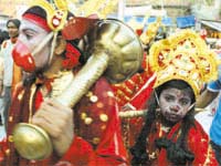 Children dress as Lord Hanuman at Langoorwala Mela at Durgiana Mandir during Navratras in Amritsar.