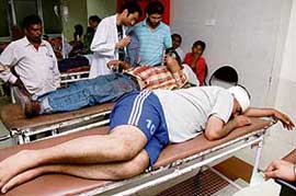Boys of Hostel No VI in Panjab University being administered medicines at Government Hospital, Sector 16, following a clash in the hostel in Chandigarh on Tuesday night. 