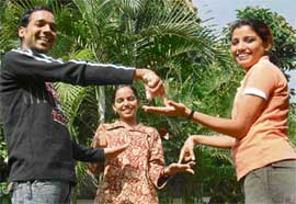 Javeed (left), Shahana (centre) and Imroz (right) demonstrate their games of smiles in Chandigarh on Monday.