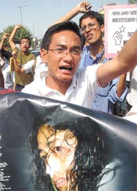 Manipuri students demonstrating in support of Sharmila Chanu, a Nobel Peace Prize 2005 nominee, who is crusading against imposition of the Armed Forces Special Powers Act 1958 in the state, at ITO on Wednesday. She has allegedly 