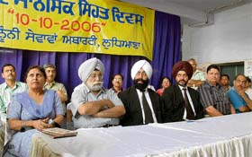 Mr Gurbir Singh, Additional Sessions Judge, and Mr S.S. Dhaliwal, Civil Judge, Senior Division, at a seminar on the occasion of World Mental Health Day in Ludhiana