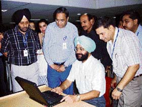 Dr Daljit Singh, Principal, DMCH, launches a wireless Internet facility in Ludhiana
