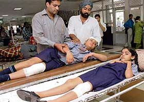 Two of the injured students, Maninderpreet Singh and his sister Prabhsimran Kaur, at the Sector 16 General Hospital in Chandigarh