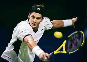 Swedens Joachim Johansson in action against Rafael Nadal of Spain in the second round of the Stockholm Open