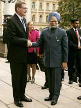 Prime Minister Manmohan Singh shakes hands with Finnish Prime Minister Matti Vanhanen during their meeting in Helsinki on Thursday