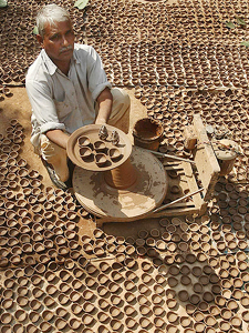 A potter displays diyas as Divali draws nearer at Kumhar Colony in Chandigarh on Monday