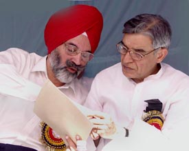 Union Minister of State for Finance Pawan Kumar Bansal discusses a point with Vice-Chancellor of Punjab Agricultural University K.S. Aulakh during a seminar at the university in Ludhiana on Monday