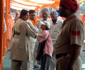 Ms M.G Welseley being pushed aside by police personnel near the Government College for Women in Ludhiana