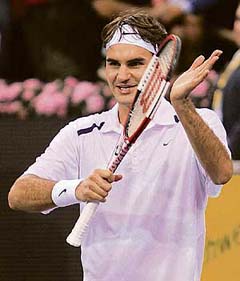 Switzerlands Roger Federer celebrates after beating Chiles Nicolas Massu in the second round at the Madrid Masters Series in Madrid 