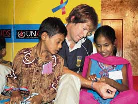 South African fielding coach Jonty Rhodes spends time with HIV positive children at a programme organised by UNICEF, in Ahmedabad on Thursday.
