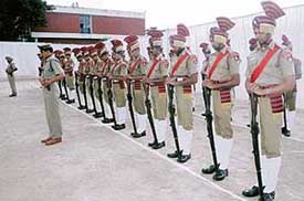 Police officers and jawans pay homage to police martyrs during a Police Commemoration Day parade held at Sector 17 police station in Chandigarh on Saturday