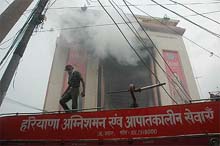 A fire breaks out in a shop in the wholesale cloth market of Ambala City on Sunday.