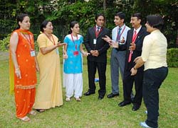 Students and teachers who won the Air India/The Tribune Rank and Bold awards interact with each other at the Indian High Commission in Singapore.
