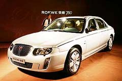 A visitor looks at the new Roewe 750, launched by Chinese car-maker SAIC Motor Corp, in Shanghai