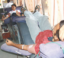 Students of Jawaharlal Nehru University (JNU) donate blood at a camp held in the campus 