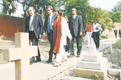 British High Commissioner Sir Michael Arthur (center) visiting Nicholson Cemetery, which has been restored and renovated after 200 years of neglect.