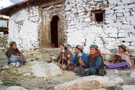 Villagers of Nako gather for a spiritual evening