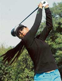 Shruti Khanna watches her T shot during the BILT Punjab Open Ladies Amateur Golf Championship