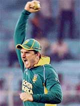 South Africas captain Graeme Smith celebrates the wicket of Lasith Malinga of Sri Lanka during their Champions Trophy match at the Sardar Patel Cricket Stadium in Ahmedabad on Tuesday