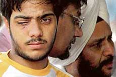 Hardhik Jain, who was hit by a ball during the match between Pakistan and New Zealand at PCA Stadium, Mohali, on Wednesday. 