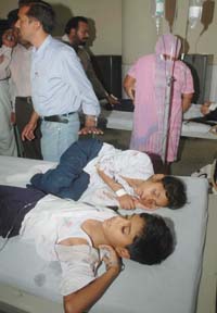 Students of Sewak Public High School, Nakodar, take treatment at Civil Hospital, Jalandhar, after their school van met with an accident