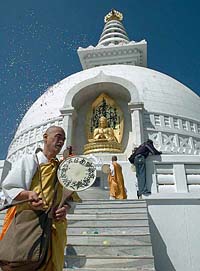 Buddhist monks offer prayer on the occasion of the 2550th birth anniversary of Lord Buddha at Rajgir in Nalanda on Wednesday.