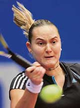 Nadia Petrova of Russia returns the ball to Shahar Peer of Israel during their Generali Linz second round match in Linz