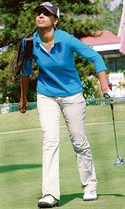 Shruti Khanna walks away after completing the 18th hole in the Punjab Open Ladies Amateur Golf Championship at the Chandigarh Golf Club