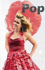 Welsh singer Katherine Jenkins wears a dress made of 2,500 poppies as she launches the 2006 Poppy Appeal in central London