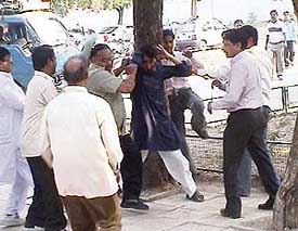 Members of both families clash in the Sector 25 Cremation Ground on Thursday for performing the last rites of Neeru, who died under mysterious circumstances at the PGI, Chandigarh, on Wednesday .