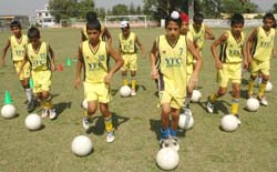 Budding players practice at the Rurka Kalan Football Academy in Jalandhar