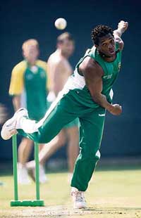 South Africas Makhaya Ntini bowls during a training session at the PCA Stadium in Mohali on Thursday. South Africa take on Pakistan in a Group B match on Friday. 