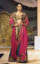 A model displays a Sabysachi Mukherjee's creation at the music launch of film Babul in Mumbai late on Thursday.