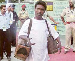 Jai Ram, a cobbler, comes out of VIP gate at the PCA Stadium in Mohali 