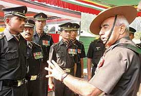 The Chief of Staff, Western Command, Lieut-Gen A.N. Aul, (right) interacts with Infantry officers after a special sainik sammelan organised to mark the 59th Infantry Day at Chandimandir on Friday.