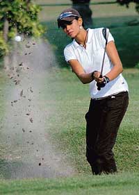 Sharmila Nicolette drives the ball during the Punjab Open Ladies Amateur Golf Championship in Chandigarh on Friday.
