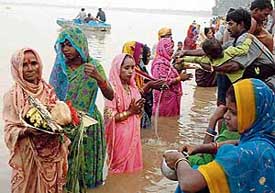 Devotees celebrate chath pooja at Sukhna Lake in Chandigarh on Saturday
